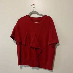 Universal Standard, short sleeve red sweater.